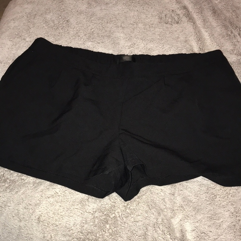 Black mission shorts with pockets
